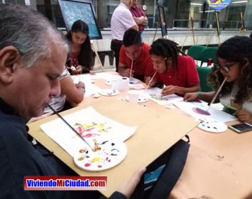 Joel Ramos en el Dia Munidal Pintor Boca y Pie